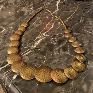 A big gold necklace in excellent condition.